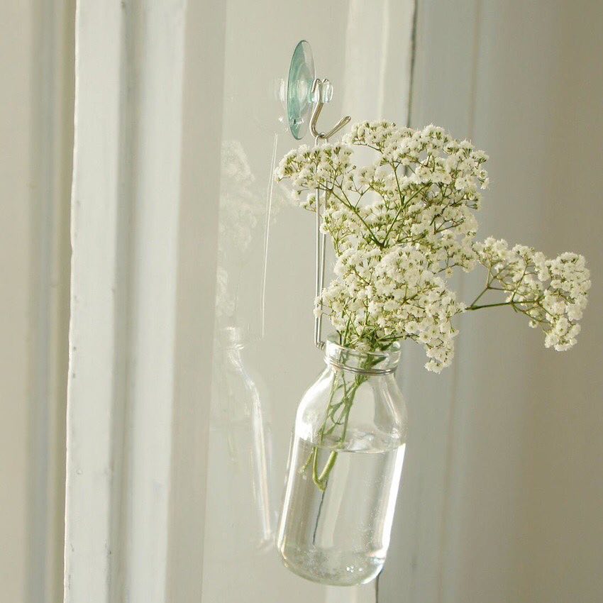 Crystal flower holder with suction cup